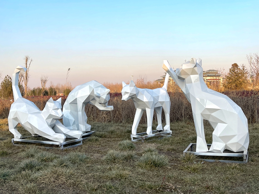 outdoor white geometric cat sculpture