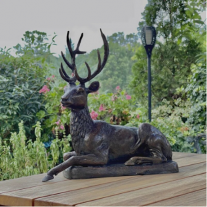 bronze deer statue in garden