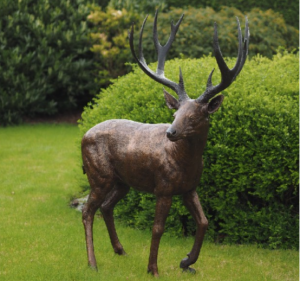 bronze deer statue in park