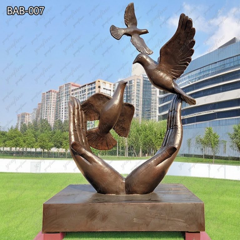 bird in hand sculpture (1)